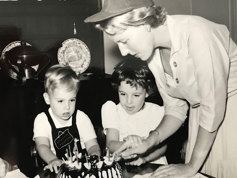 Alex and two children celebrating birthday